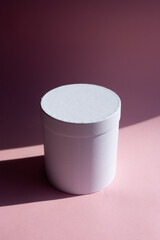 Pink gift box on pink background