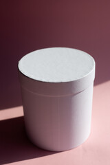 Pink gift box on pink background