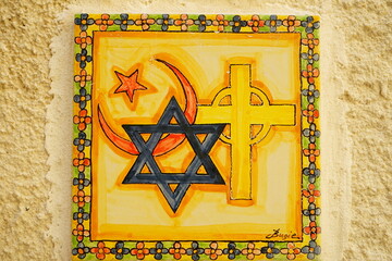 Islamic, Christian and Jewish peace symbol on majolica
