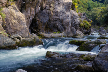 Beautiful rive with fresh blue water and long rock. In japan forest
