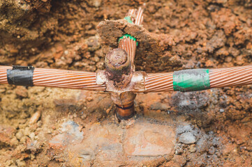 Welding copper ground wire on ground rod.Welding copper ground wire.Connect copper grounding lightning protection system. With the melting