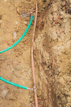 Welding copper ground wire on ground rod.Welding copper ground wire.Connect copper grounding lightning protection system. With the melting