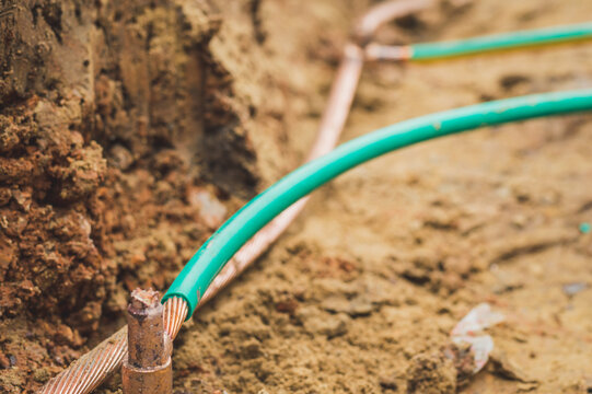 Welding copper ground wire on ground rod.Welding copper ground wire.Connect copper grounding lightning protection system. With the melting