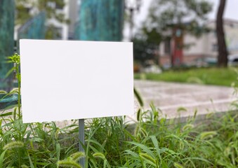 blank sign on grass