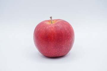 Red apple on a white background.