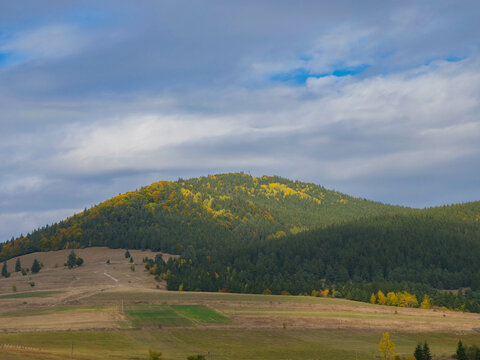 Mount Csiksomlyo in hungarian, Sumuleu Ciuc in romanian in fall colors in Transylvania, Romania.