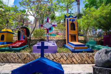 Cancun, Mexico. May 30, 2021. Colorful catholic cemetery in Xcaret ecotourism park. Famous ecotourism and archaeological park