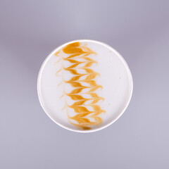 Hot and tasty latte coffee in paper  cup, coffee to go 