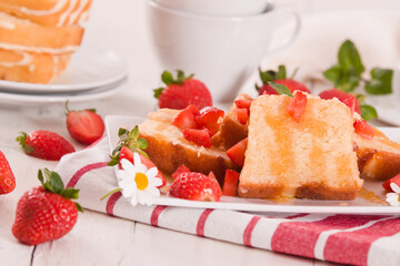 Lemon pound cake with honey and fresh strawberries.