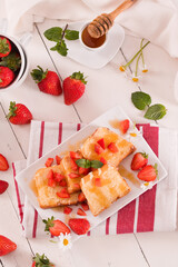 Lemon pound cake with honey and fresh strawberries.