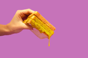 Christmas sandwich with golden glittering. Bizarre concept.