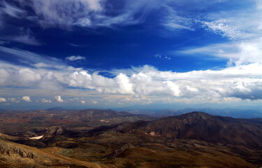 Fototapeta na wymiar Touching the clouds from the peak of Taurus, looking at the plains