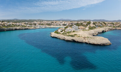 Aerial view of the bay of Porto Cristo as seen from the sea. A nice view of the city and its port....