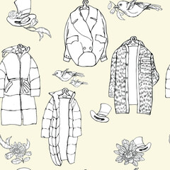 vector illustration seamless pattern,silhouette of outerwear on hangers,for  wallpaper or fabric