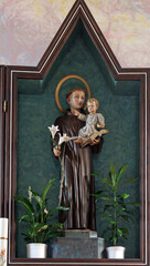 Saint Anthony holds the baby Jesus, the main altar in the church of Saint Anthony of Padua in...