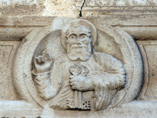 Saint Peter, relief on the portal of the parish church of Our Lady outside the city in Sibenik, Croatia