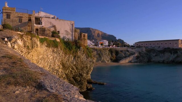 View of southern italy coast and tipical houses at the sunset