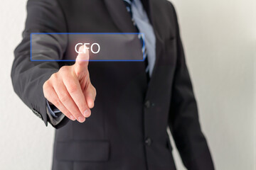A Businessman is pressing a virtual button with the word CFO