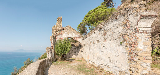 ruins of S. Anna church overhanging Tigullio coast near Cavi, Italy