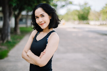 A beautiful woman stretching her body before going for a run in the morning.women's health care concept