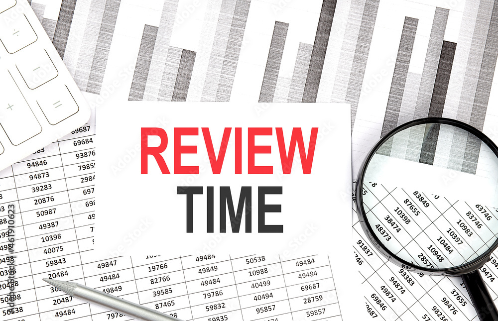Poster review time text on document with pen,graph and magnifier,calculator