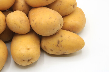 Whole potatoes isolated on a white background