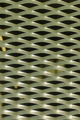 Silver metal pattern with holes (wall fence) makes for a beautiful background