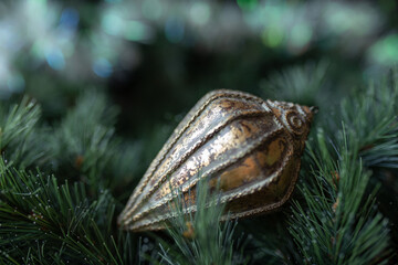 Merry Christmas and Happy New Year greeting card. Golden christmas tree decoration.