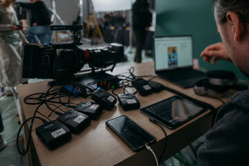 Sound engineer with a microphone on the set. A professional sound engineer at work on the filming of a movie, commercial or TV series.