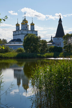 Russia. Joseph-Volokolamsk Monastery. View across the Guryevskoe lake. Assumption Cathedral and Nikolskaya Tower