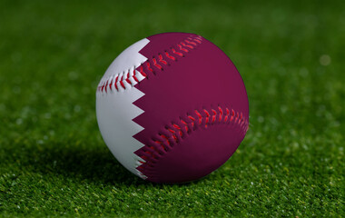 Baseball with Qatar flag on green grass background, close up