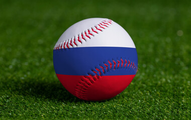 Baseball with Russia flag on green grass background, close up
