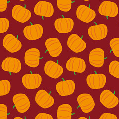 Cute pumpkin pattern on a dark red background