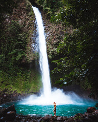 Vertical shot of a La Fortuna Waterfall Alajuela Costa Rica - obrazy, fototapety, plakaty