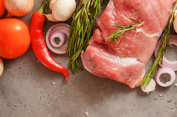 pork tenderloin with rosemary, mushrooms, tomato,  onion, chili pepper