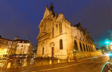 Fototapeta na wymiar Church of Saint-Etienne-du-Mont at rainy night. It was built in 1494-1624 and located near the Pantheon - Paris, France
