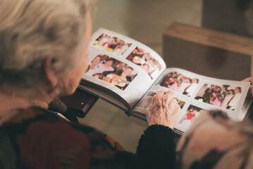 Old woman with photo album