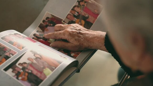 Old woman with photo album