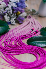 Obraz na płótnie Canvas Colored braids, hair accessory on an elastic band