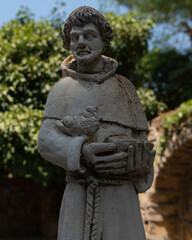 Fototapeta premium Saint Statue In The Garden Of Virgin Mary House