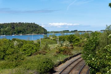 Fototapeta premium Train line along Conwy, North Wales
