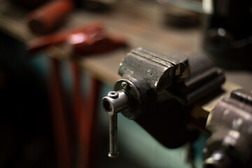 Fototapeta na wymiar Working tools in the garage. Details of the metal workshop.