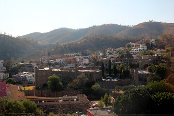 Fototapeta na wymiar View of the city of Guanajuato Mexico with its medieval colonial style stone buildings between mountains 