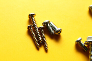 Phillips screwdriver has a head with pointed edges in the shape of a cross