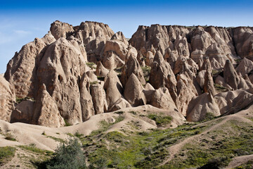 Fototapeta na wymiar Erosion-sculpted tuff formations in Devrent Valley (Imagination Valley, Pink Valley), Cappadocia, Turkey