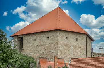 View of the newly restored Varkoch gate tower at the castle of Eger site of a major battle between the Turks and Hungarians in the middle ages with cloudy blue sky