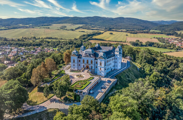 Aerial view of Halic castle in Slovakia, mansion with manicured garden brick driveway with pattern