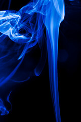 Motion blue smoke on black background.