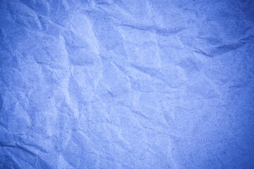 Recycling blue paper crumpled background.