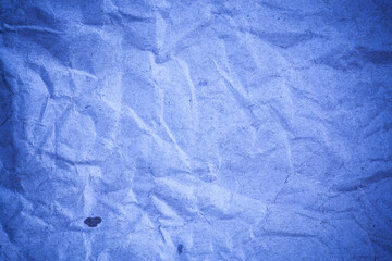 Recycling blue paper crumpled background.